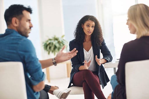 man and woman participate in mediation to help with communication KHM Attorneys at Law Colorado Springs, Castle Rock
