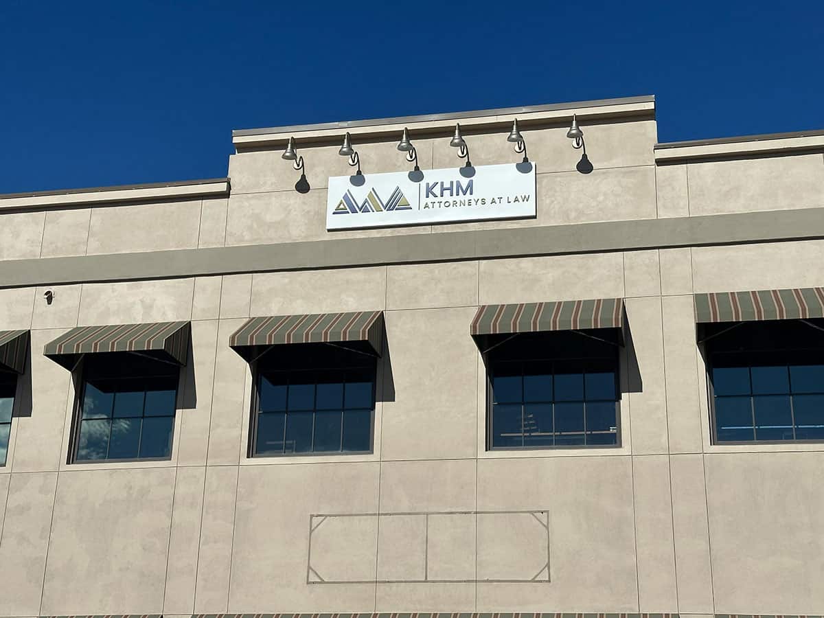 KHM Douglas County office - front of building and picture of sign