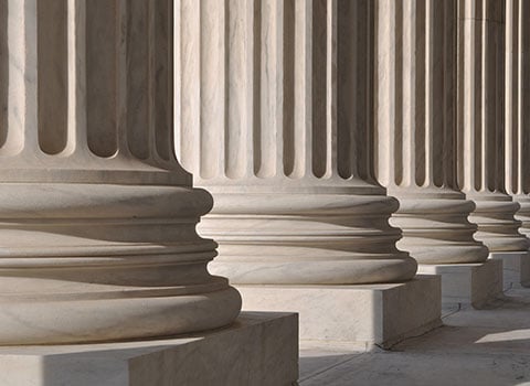 close up of courthouse columns in front of building KHM Attorneys at Law Colorado Springs, Castle Rock