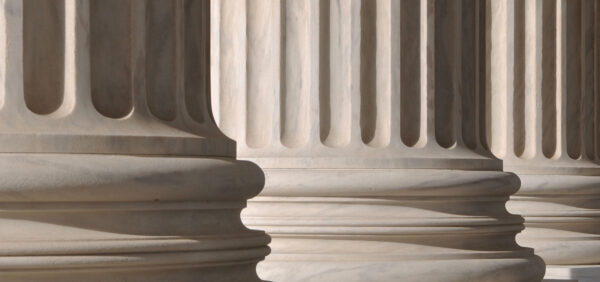 close up of courthouse columns in front of building KHM Attorneys at Law Colorado Springs, Castle Rock